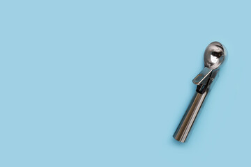 Ice cream scoop on blue background