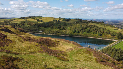 View of the Torduff Reservoir in Scotland. A small elongated reservoir retained by an earth...