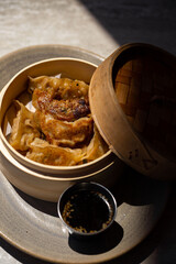 Angled shot of dumplings in a basket 