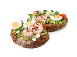 Delicious sandwiches with guacamole, shrimps and eggs on white background