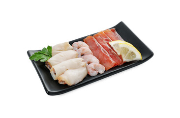 Sashimi set (raw slices of salmon, oily fish and shrimps) served with lemon and parsley isolated on white