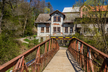 Fototapeta na wymiar Foot bridge over Jizera river in Semily, Czechia