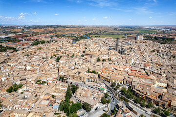 Fototapeta na wymiar Aerial view of the old city on the hill of Toledo, Spain on a sunny day
