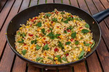 Pan of rice with vegetables