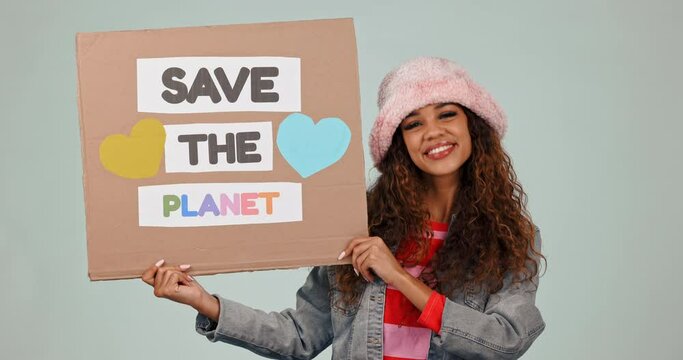 Climate change, smile and save the planet poster with a woman in studio on a gray background. Portrait, recycle or global warming with a young poster on earth day for sustainability or ecology