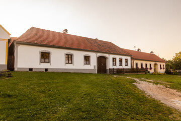Traditional houses of rural baroque style in Holasovice village, Czech Republic