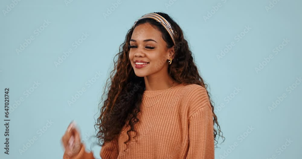 Poster Fashion, blow kiss and face of woman in studio with smile for confidence, love hand gesture and flirting. Emoji, affection and portrait of person with trendy clothes and style on blue background