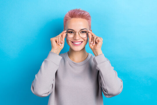 Photo of confident manager business woman wearing grey trendy pullover hold glasses nice quality isolated on blue color background