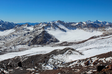 Fototapeta premium Mountains in Mount Elbrus region, the highest mountain peak in Russia