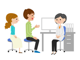 診察室で女性医師に説明する若い夫婦