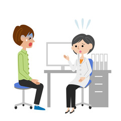 診察室で女性医師に説明を受けてショックを受ける若い男性