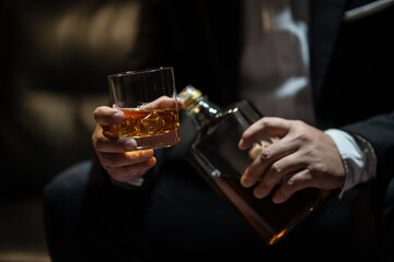 Businessmen in suits drinking  Celebrate whiskey.