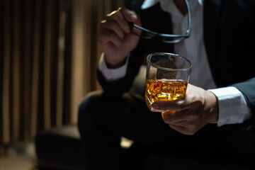 Businessmen in suits drinking  Celebrate whiskey.