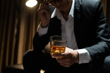 Businessmen in suits drinking  Celebrate whiskey.