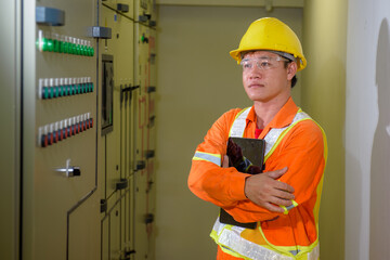 electrical engineer using tablet checking and service