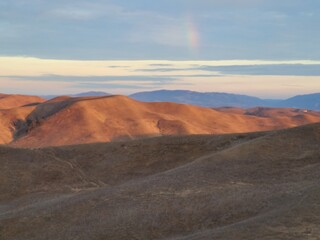 Naklejka premium Sunset rainbow in the East Bay Hills in San Ramon, California