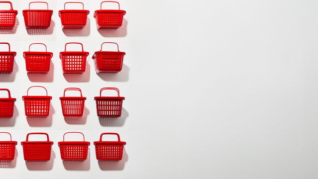 Empty red shopping basket on white background with copy space