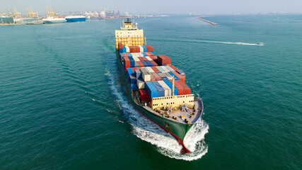 cargo logistic container ship sailing in sea to import export goods and distributing products to...