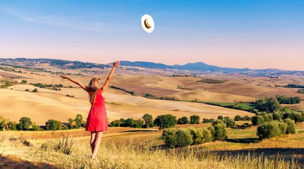 Stickers pour porte Toscane Happy young girl in Tuscany landscape- Italy- freedom,carefree,travel concept