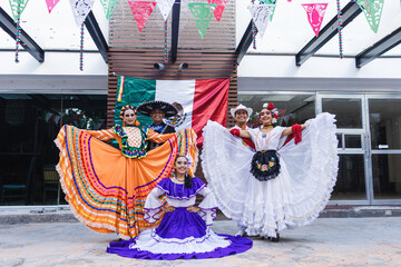 group of mexican dancers wearing traditional folk costume, portrait of young latin people in Mexico Latin America festival party, Independence day
