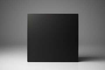 A paper black mockup display box on a dark grey background for presentation
