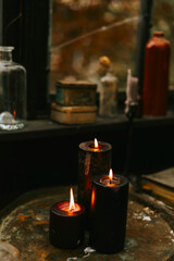 Halloween party decor in gloomy dark colors with the table is set
