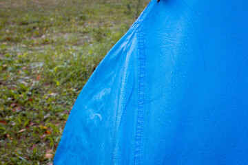 the texture of the awning. blue tent close-up