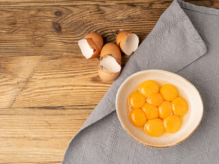 Egg Yolks in Bowl, Fresh Chicken Egg Yolk Separated from Whites for Cooking Recipe, Organic Yolks...