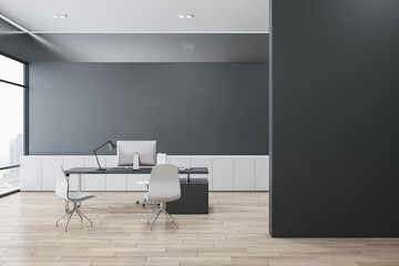 Modern office interior with mock up place on black wall, wooden parquet flooring, window and city view, furniture and equipment. Home or office workplace concept. 3D Rendering.