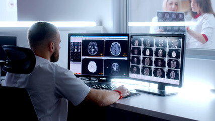 Medical hospital: neurologist use computer, analyze patient's MRI, diagnose brain. Health Clinic...