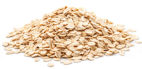 Rolled oats or oats flakes heap isolated on white background.