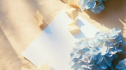 Blank paper sheet card dried blue hydrangea flowers