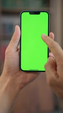 Close Up of Male Hands Using Phone with Mock Up Green Screen