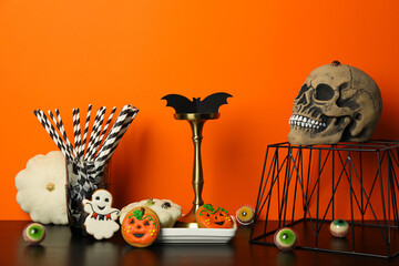 Table setting for Halloween, scary decorations with a skull