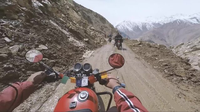 POV of Riding Motor bike on dangerous offroad Himalayan roads of Spiti Valley in Nako Himachal Pradesh India