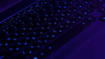 macro photo of laptop keyboard, keys with letters close