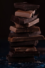 A chocolate bar broken into pieces