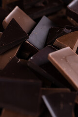 A chocolate bar broken into pieces