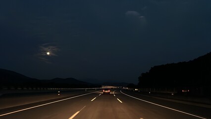driving highway in the dark sky at night time