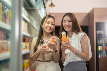 An Asian women shopping in supermarket , concept of city life lifestyle