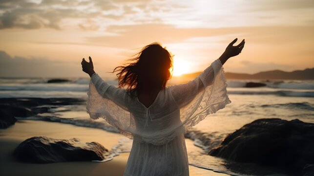Woman wearing white gawn with loose hair with wide open arms infront of beautiful beach. Created with Generative AI Technology