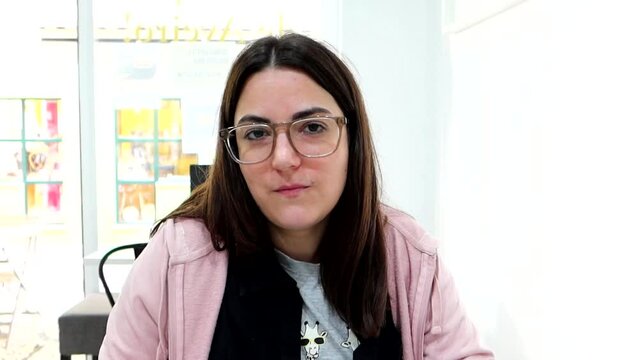 Woman savoring Bacalhau &agrave; Br&aacute;s for the first time in a restaurant of Aveiro