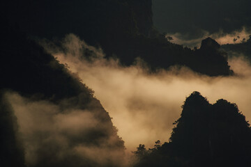 time clouds over the mountains