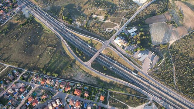 Rotating Aerial View over Highway Exit with some Traffic
