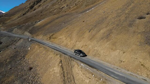 jeep off road car driving in Kaza in spiti valley in himalays small narrowed dangerous indian road exploring asia travelling concept 