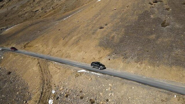 jeep off road car driving on narrowed mountains road in Kaza spiti valley himalays 