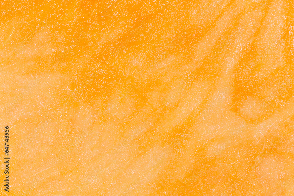 Wall mural close up of orange juicy pulp of pumpkin texture