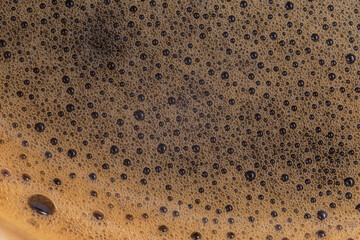 close up of foam on coffee drink