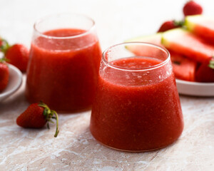 Refreshing watermelon drink with fresh strawberry