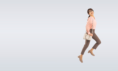 ジャンプするミドル女性（切り抜き背景透過PNGも販売しております。作成者リンクから「PNG」で検索してください）